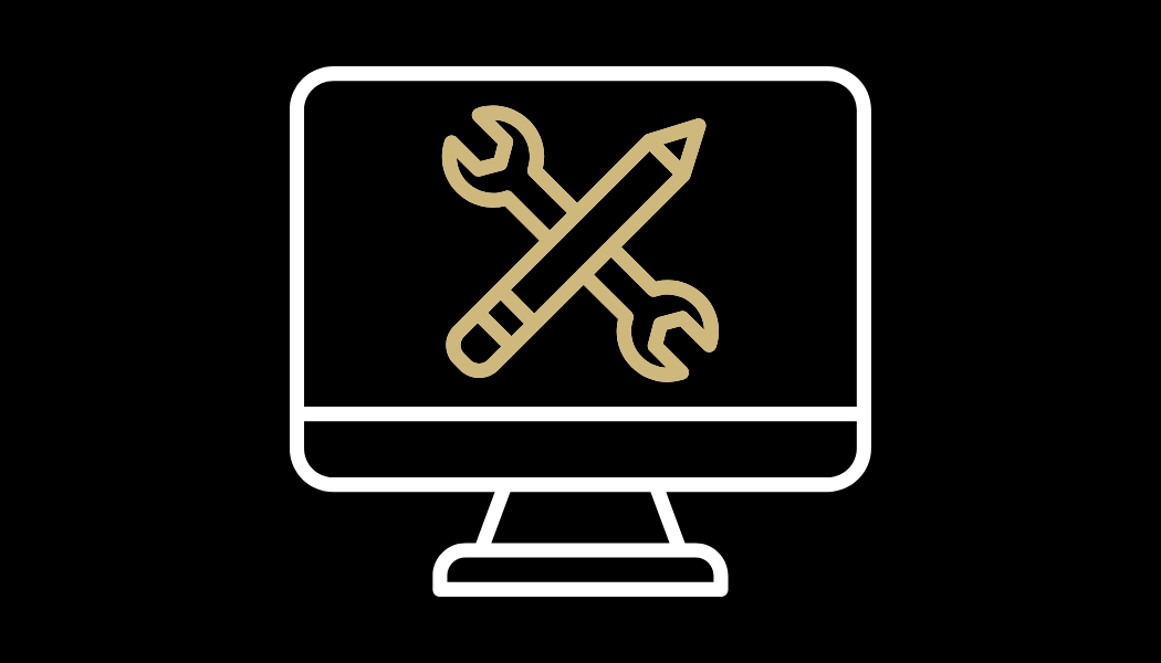 Icon of a computer with tools in the center