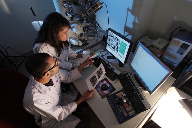 two people examining lab results