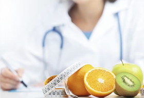 Doctor and healthy fruits