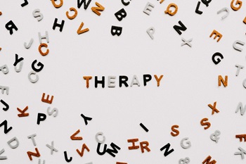 Spreaded Alphabets saying Therapy